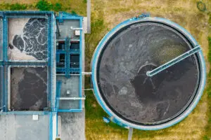 Water Treatment Plant with Round Cylinder of Clarifier Sedimentation Tank, Aerial Top View